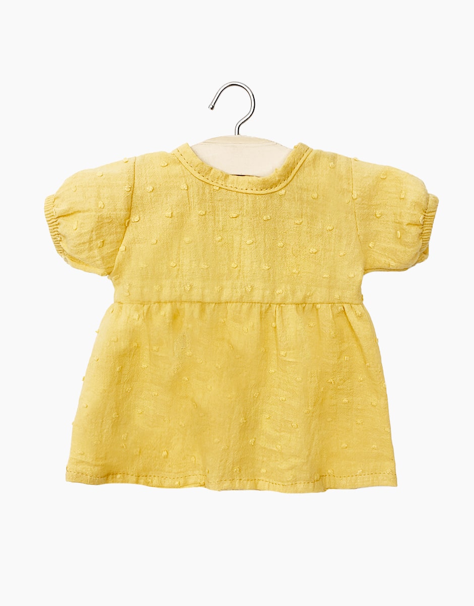 Robe Faustine plumetis moutarde pour poupées Babies - Minikane