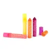 Quatre gros feutres Les Toupitis colorés rose, jaune, orange et violet avec pointes coniques.
