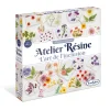 Boîte Atelier Résine L'Art de l'Inclusion avec fleurs séchées et pendentifs en résine transparente