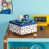 Boîte à musique Puce et Pilou moulin rotie à pois blancs et noirs avec figurines chien blanc et noir.
