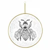 Cadre rond métal doré suspendu avec dessin noir d'abeille et fleur 20 cm
