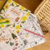 Cahier de coloriage Les Minouchkas avec pages à colorier, crayons et autocollants colorés.