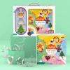 Coffret Chefclub Kids avec emporte-pièces métal et recettes festives colorées.