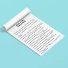 Feuillet blanc avec texte noir en français sur fond bleu clair, script Jean-Marc Parfumerie.