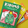Trois livres Kidimö colorés pour enfants avec illustrations festives et personnages amusants.