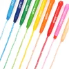 Crayons gel OMY alignés, couleurs bleu, vert, jaune, orange, rouge, rose et beige, capuchons fermés.