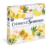 Boîte Crèmes & Senteurs Sentosphère avec fruits, fleurs, crèmes blanches et flacon huile jaune
