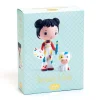 Figurine Tinyly Barbouille en salopette blanche avec palette, et Gribs la vache blanche tachetée.