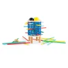 Giga bomb Les Loufoques, jeu en bois avec cylindre bleu, bâtonnets colorés et balles jaune et noire.