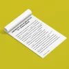 Feuillet blanc incliné sur fond jaune, texte noir et titres en majuscules, Histoires à compléter KIMOMÖ.