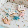 Hochet anneau bois Lapin bleu La petite école de danse - Moulin Roty