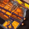 Plateau de jeu Incantibus avec baguettes magiques bleues et illustrations orange.