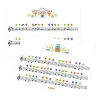 Partitions colorées avec notes noires, symboles verts, bleus, oranges et illustrations Djeco.