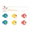 Jouet de pêche magnétique Janod Box avec canne bois, poisson bleu, jaune et rouge.