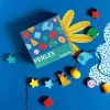 Jeu de perles en bois à enfiler Les toupitis - Moulin Roty
