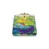 Plateau coloré du jeu Clefs Magiques avec château en fond et pions clés en plastique.