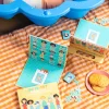 Jeu magnétique Qui es-tu ? avec plateau, cartes personnages et croix blanches.