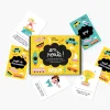 Boîte jaune Kit de discussion En route ! Minus avec cartes colorées illustrées variées.