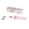 Lampe à histoires rose avec trois disques couleur pastel et boîte décor nuages Moulin Roty
