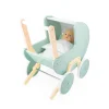 Landau Zen Janod en bois vert pastel avec poupée et tissu blanc.