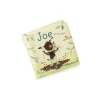 Livre de bain magique Wash Wash Joe, personnage marron dans boue, fond beige vert.