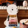 Métallophone bois forme chat blanc rose et ocre lettres musicales colorées