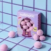 Boîte violette de mini billes de bain effervescentes Berry Bloom Nailmatic, billes roses.