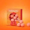 Mini bombes de bain effervescentes orange Sweet Mango Nailmatic, boîte colorée.