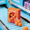Boîte orange Mini billes de bain Sweet Mango Nailmatic avec billes effervescentes