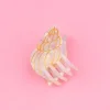 Mini pince à cheveux nacrée forme coquillage avec lignes dorées, Coucou Suzette