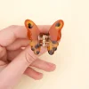 Mini pince à cheveux papillon de nuit couleur caramel translucide à motifs noirs
