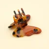 Mini pince à cheveux Papillon de nuit en plastique translucide marron tacheté noir