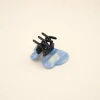 Mini pince à cheveux noire avec côté papillon lavande en plastique nacré