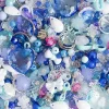 Perles mix Frozen bleues, blanches, transparentes et argentées, formes variées.