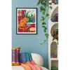 Tableau coloré avec chat orange regardant un poisson rouge dans un bocal, cadre noir