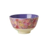 Petit bol en mélamine, extérieur fleurs rouges roses jaunes sur fond rose, intérieur violet.