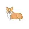Pin's émaillé représentant un chien corgi marron clair et blanc souriant, langue sortie.