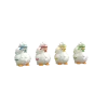 Quatre poules blanches en plastique Pouss' ta poule, couleurs bleu, rouge, jaune, vert.