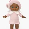 Poupée Prunelle peau foncée, yeux verts, robe rose et bonnet lutin rose peluche.