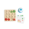 Puzzle en bois Les Loufoques avec formes rouges et vertes à encastrer, tampons et stickers colorés.