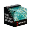 Cube puzzle Shashibo Océan aux motifs abstraits bleus et verts, boîte noire cartonnée.