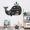 Tableau magnétique noir en forme de baleine avec magnets colorés marins
