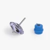 Toupie sautillante violette avec ressort métallique et lanceur bleu en plastique