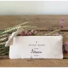 Trousse écru Marcel et Lily en tissu avec noeud et inscription Joyeux bazar Atsem adorée