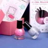 Deux flacons de vernis à ongles Magic Rosajou, rose nacré et argent pailleté, avec emballages.