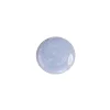 Goutte de vernis bleu clair pailleté Merlin Nailmatic, effet brillant transparent.
