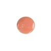 Goutte de vernis pailleté pêche clair Peachy Nailmatic sur fond blanc