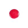 Tache ronde de vernis rose pailleté Sissi Nailmatic, texture brillante et éclatante.