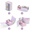 Boîte violette Tinyroom Tinyly avec étoiles, poupée et berceau en carton.