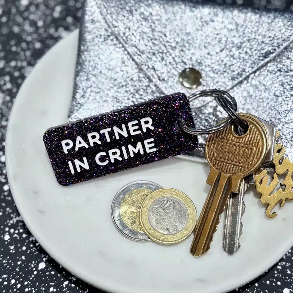 porte clés à paillettes partner in crime plus de love